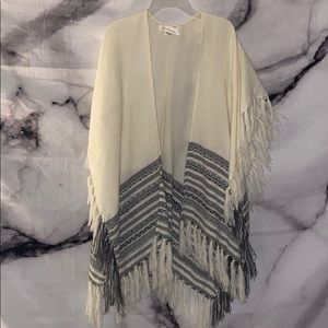 Fringe knit poncho
